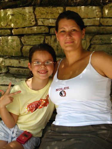 Kim and Paige posing in the shade at the Rhino exhibit